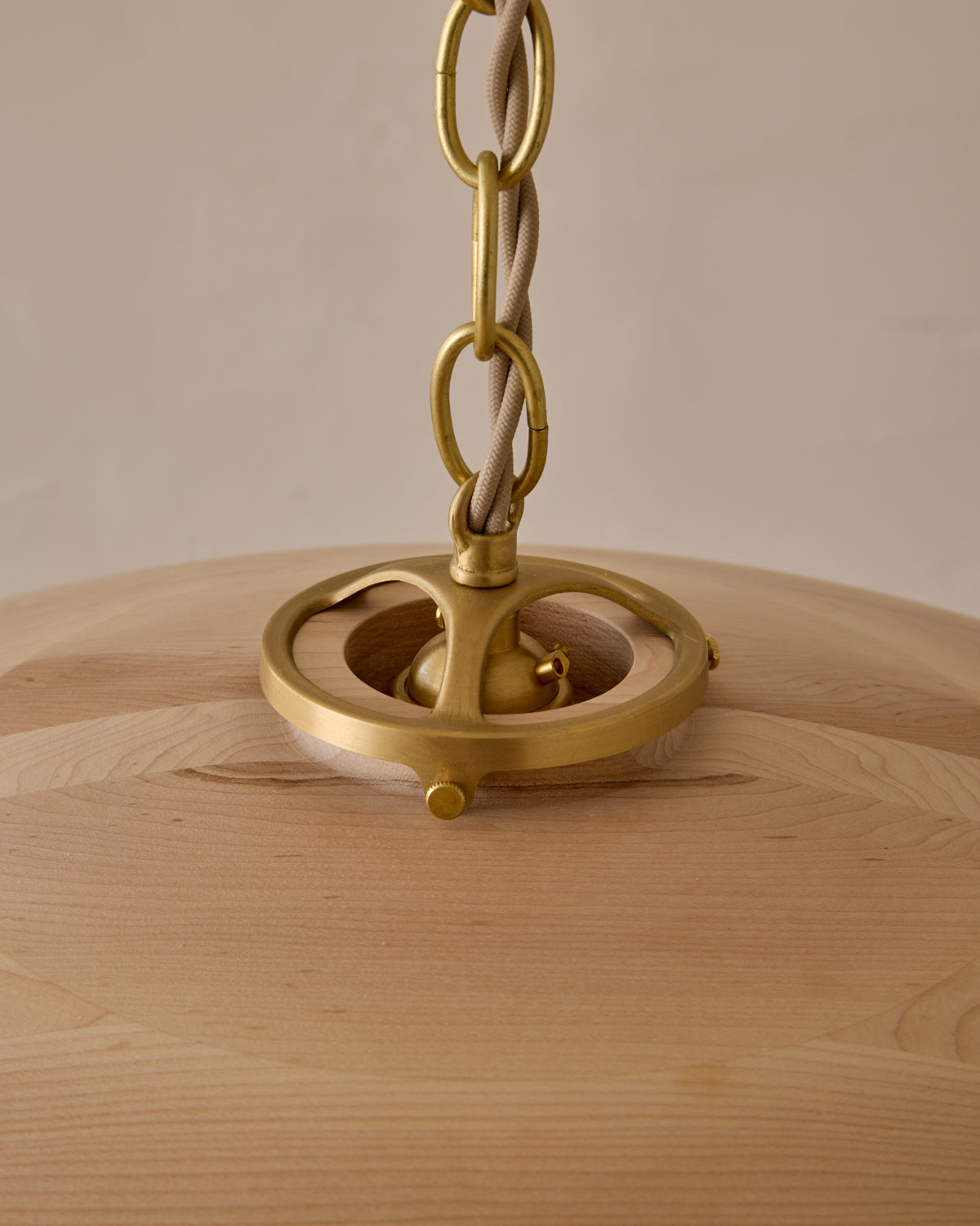 Large pendant light with oversized clear glass globe and decorative wooden clear maple shade with brass chain #shade-finish_clear maple #cord-color_beige