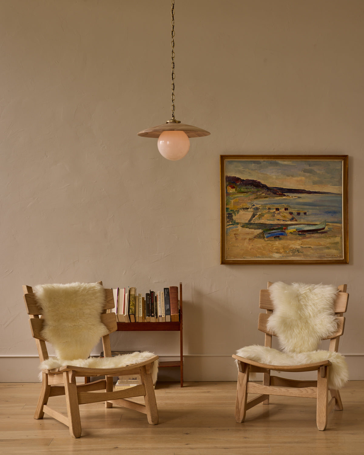 Large pendant light with oversized milk glass globe and decorative wooden clear maple shade with brass chain #shade-finish_clear maple #globe_white glass #cord-color_brown