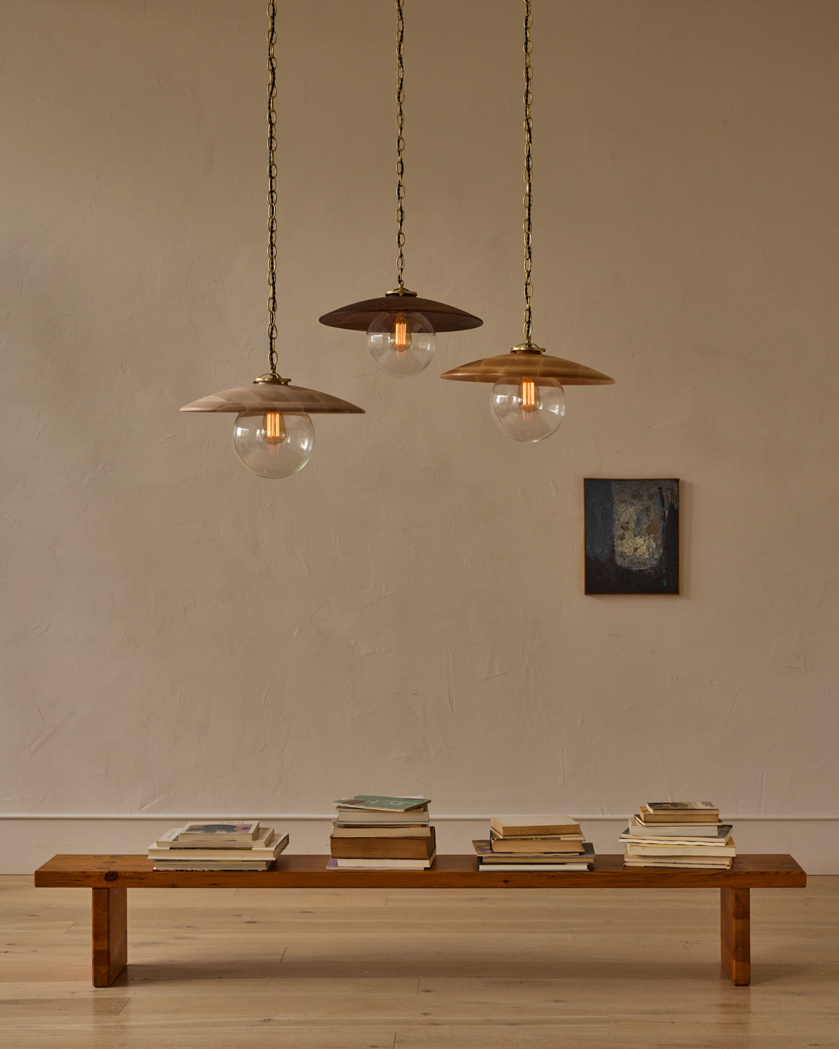 Large pendant light with oversized clear glass globe and decorative wooden clear maple shade with brass chain #shade-finish_black walnut #globe_clear glass #cord-color_brown
