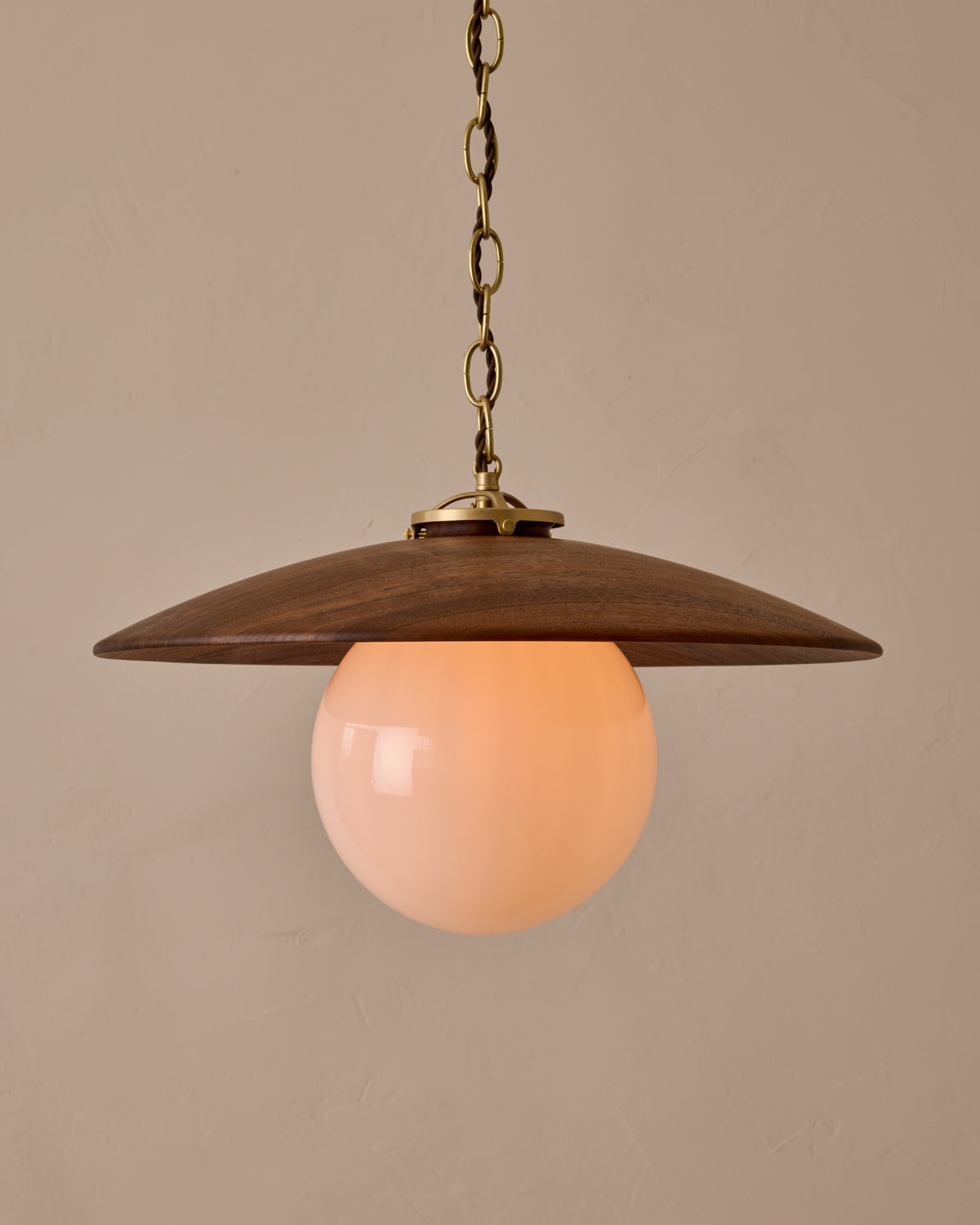 Large pendant light with oversized clear glass globe and decorative wooden clear maple shade with brass chain #shade-finish_black walnut #globe_white glass #cord-color_brown