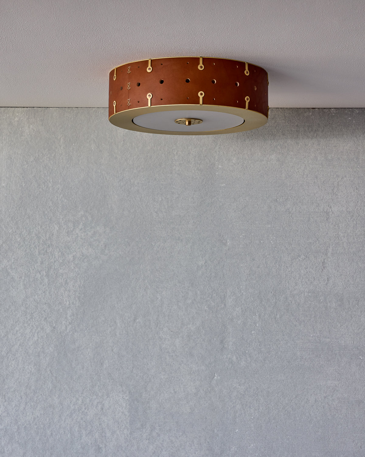 Beautiful satin brass flush mount ceiling fixture with handstitched leather drum shade #size_14" drum #leather-finish_tan harness