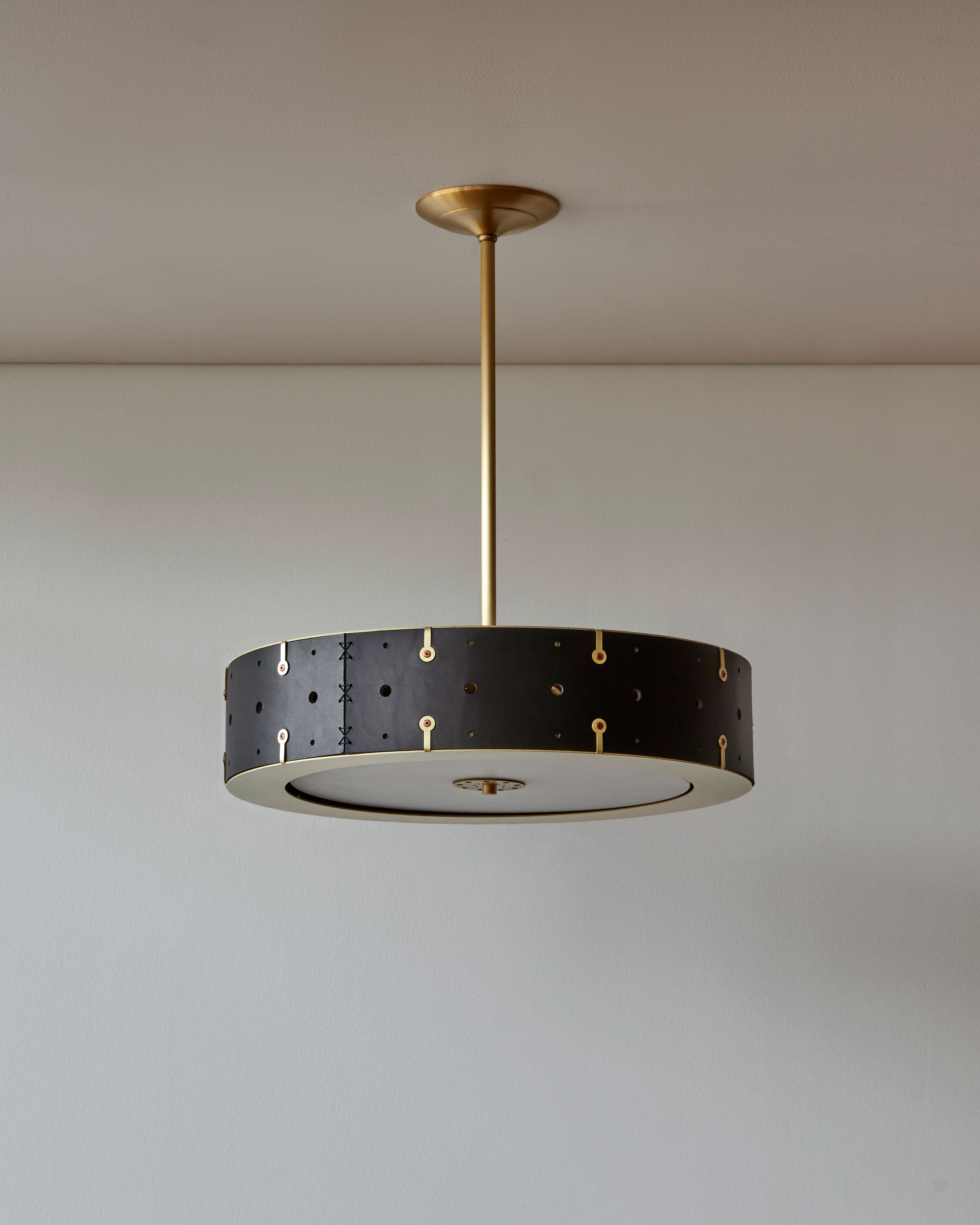 Beautiful satin brass ceiling pendant fixture with handstitched leather drum shade and customizable drop #leather-color_black harness #size_18" drum