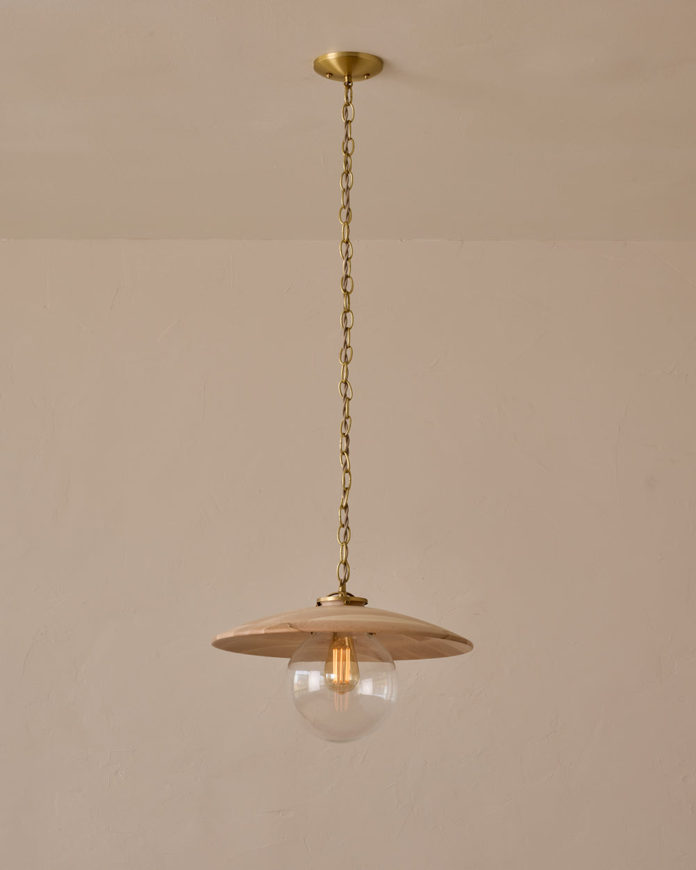 Large pendant light with oversized clear glass globe and decorative wooden clear maple shade with brass chain #shade-finish_clear maple #globe_clear glass #cord-color_beige