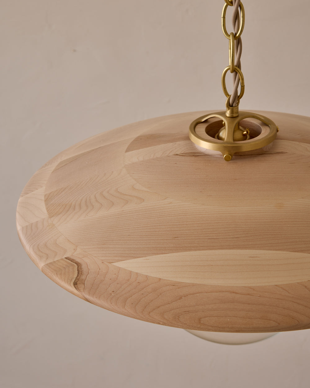 Large pendant light with oversized clear glass globe and decorative wooden clear maple shade with brass chain #shade-finish_clear maple #globe_clear glass #cord-color_beige
