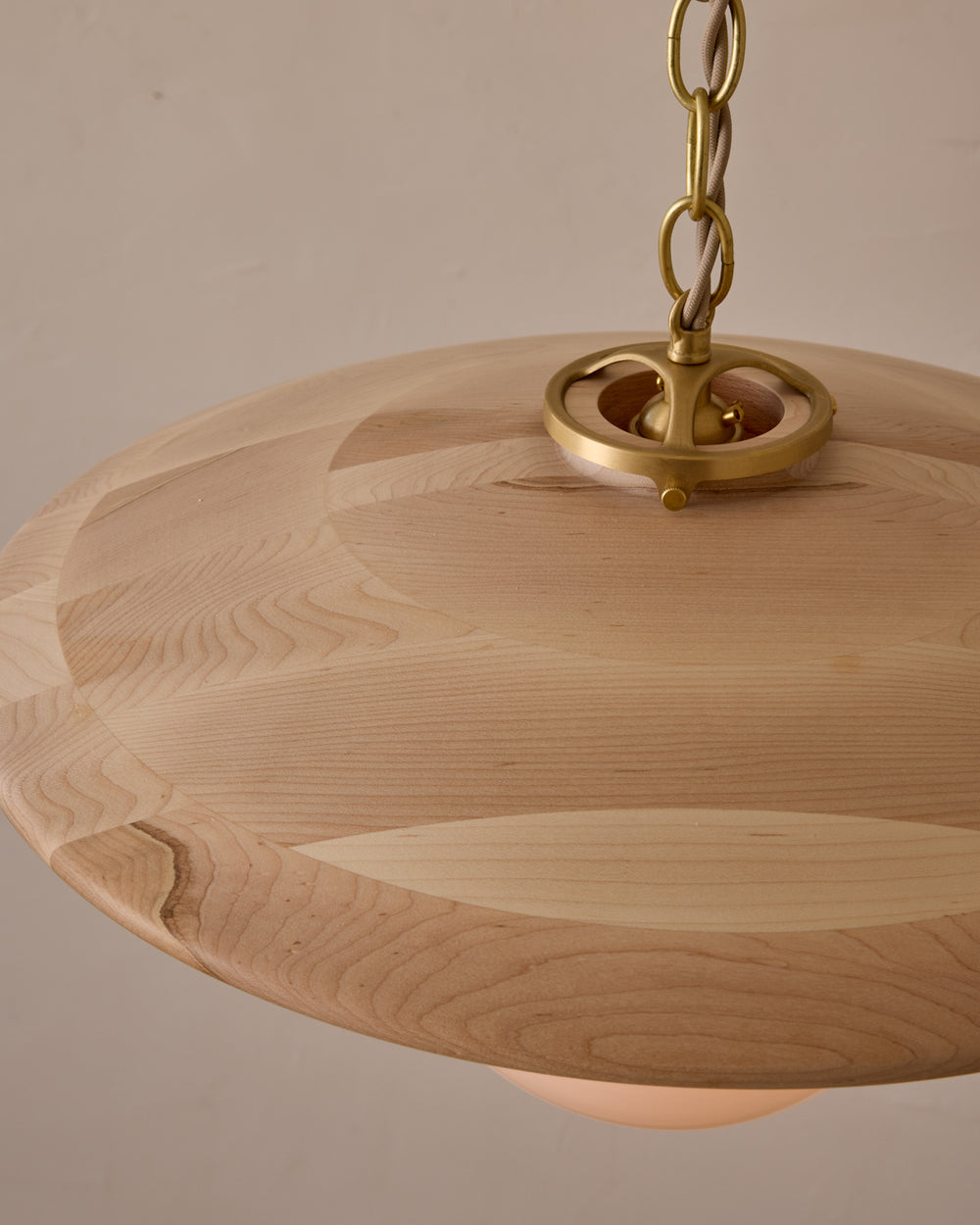 Large pendant light with oversized milk glass globe and decorative wooden clear maple shade with brass chain #shade-finish_clear maple #globe_white glass #cord-color_beige