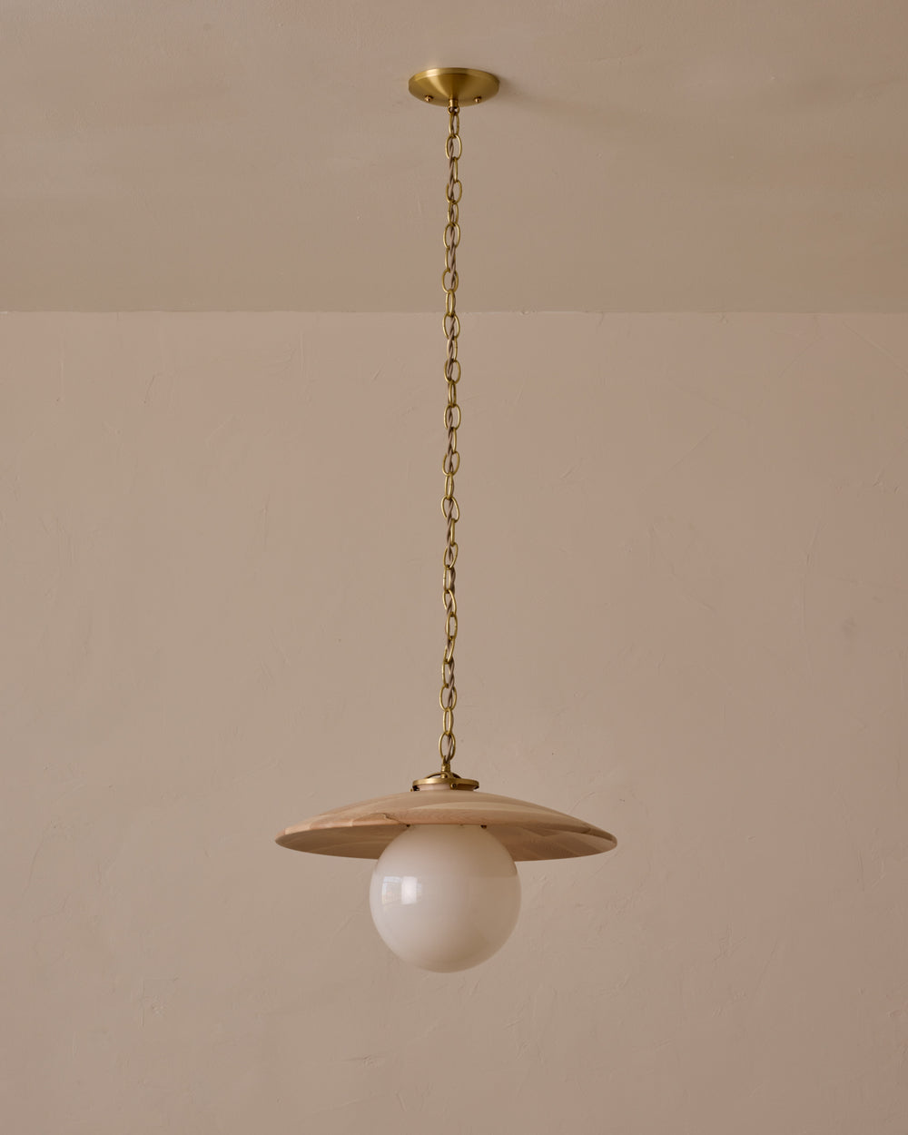 Large pendant light with oversized milk glass globe and decorative wooden clear maple shade with brass chain #shade-finish_clear maple #globe_white glass #cord-color_beige
