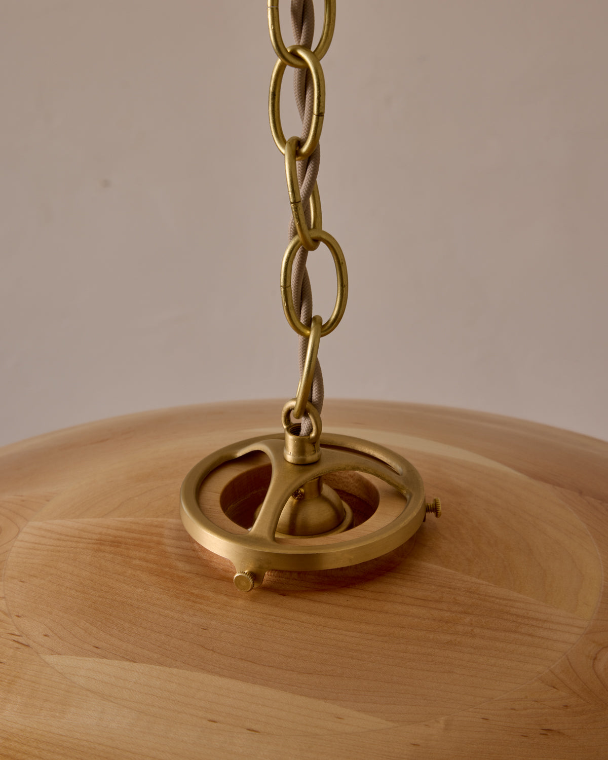 Large pendant light with oversized clear glass globe and decorative wooden clear maple shade with brass chain  #shade-finish_natural maple #cord-color_beige