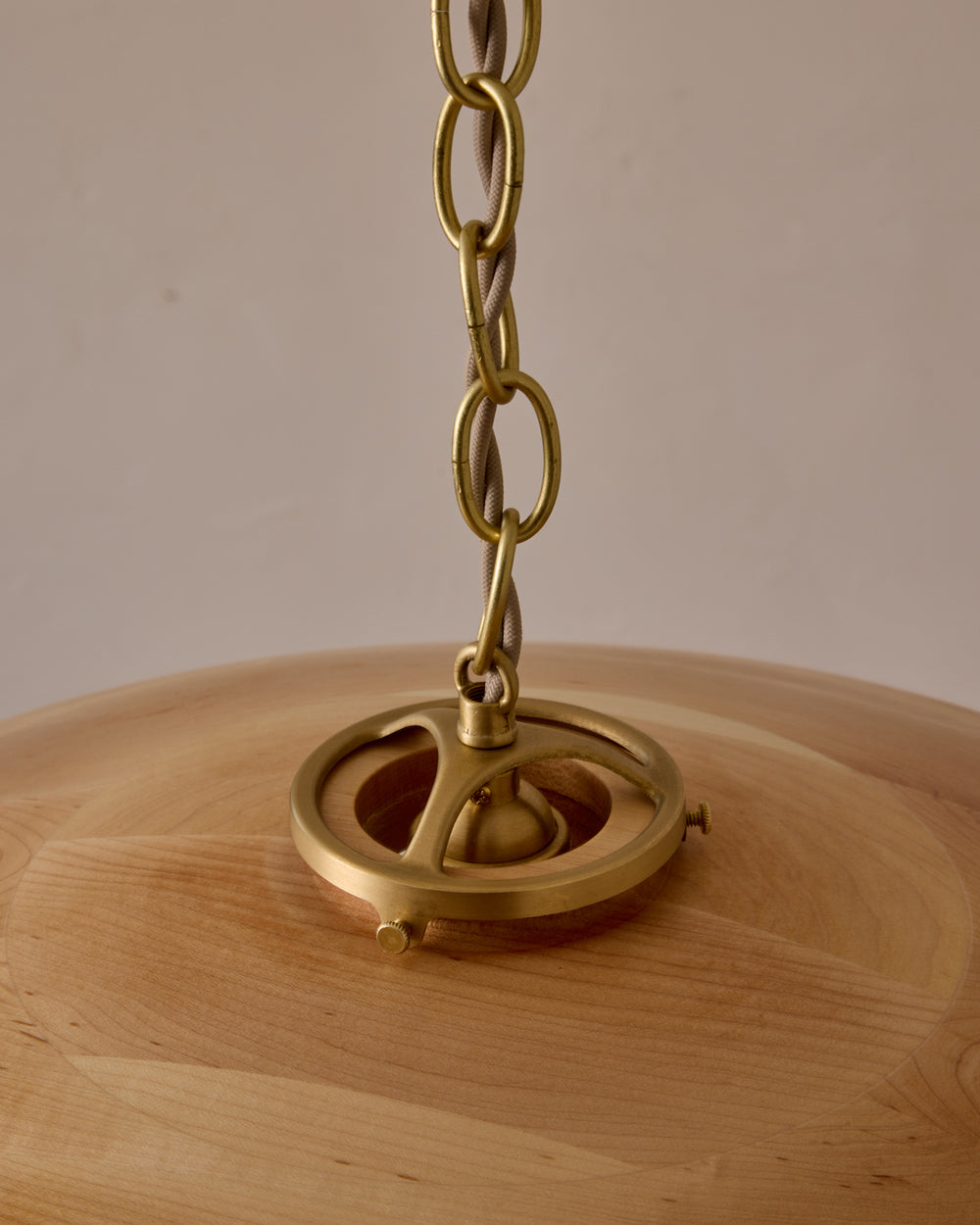 Large pendant light with oversized clear glass globe and decorative wooden clear maple shade with brass chain  #shade-finish_natural maple #cord-color_beige