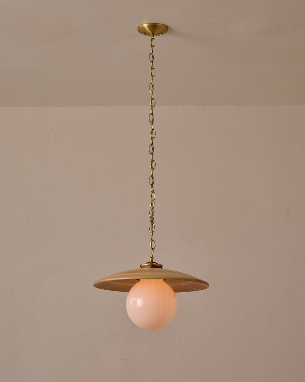 Large pendant light with oversized clear glass globe and decorative wooden clear maple shade with brass chain  #shade-finish_natural maple #globe_white glass #cord-color_beige