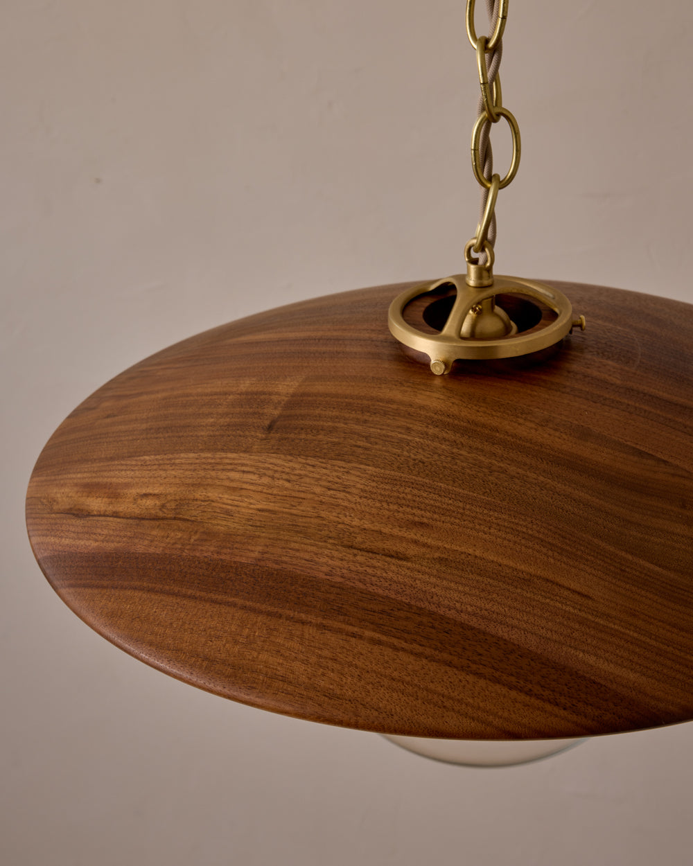 Large pendant light with oversized clear glass globe and decorative wooden clear maple shade with brass chain  #shade-finish_black walnut #globe_clear glass #cord-color_beige
