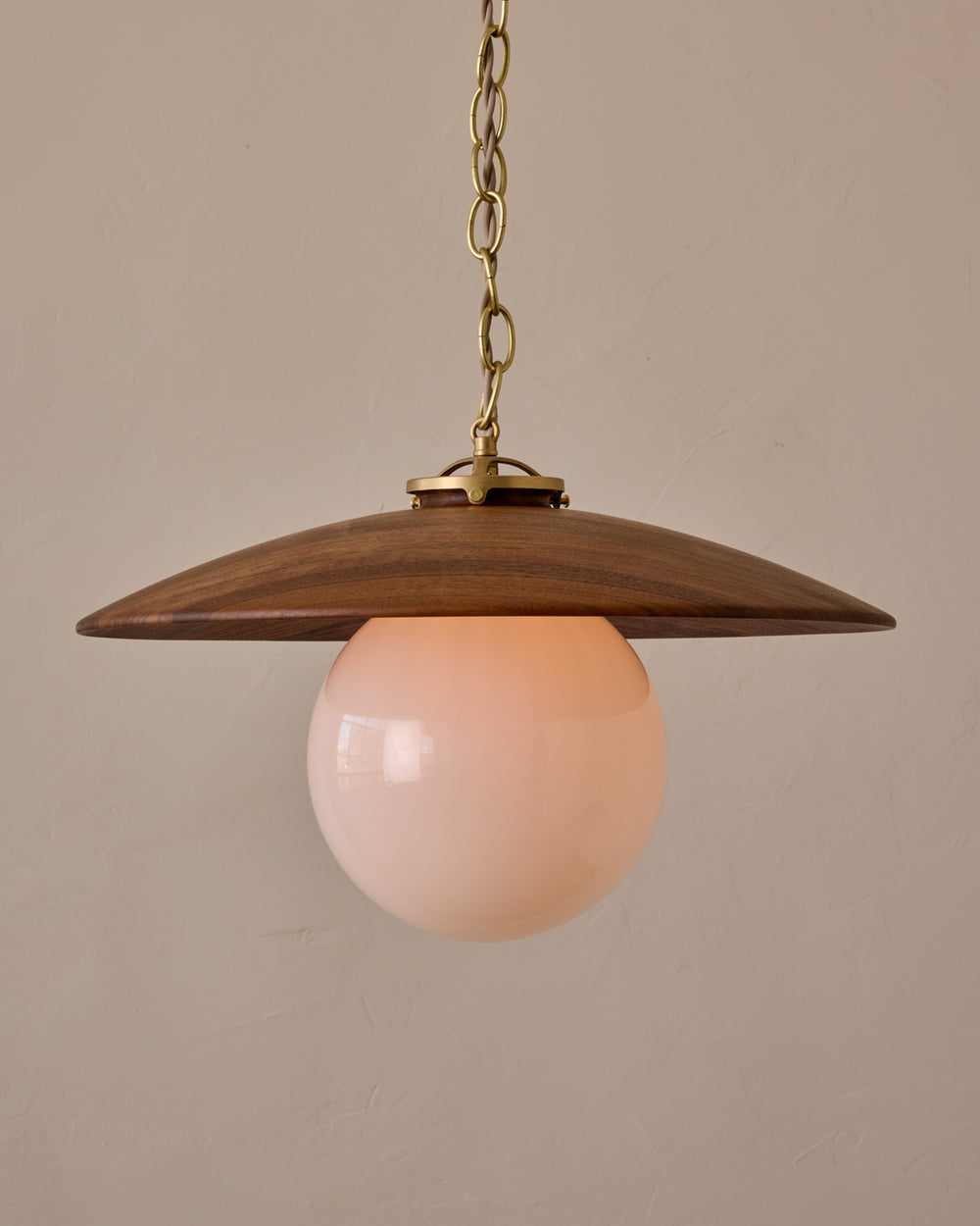 Large pendant light with oversized clear glass globe and decorative wooden clear maple shade with brass chain  #shade-finish_black walnut #globe_white glass #cord-color_beige
