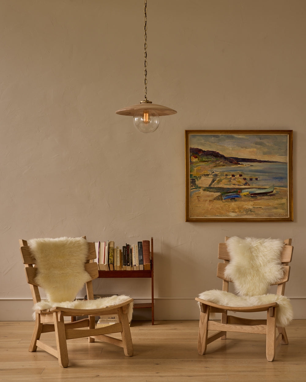 Large pendant light with oversized clear glass globe and decorative wooden clear maple shade with brass chain #shade-finish_clear maple #globe_clear glass #cord-color_brown