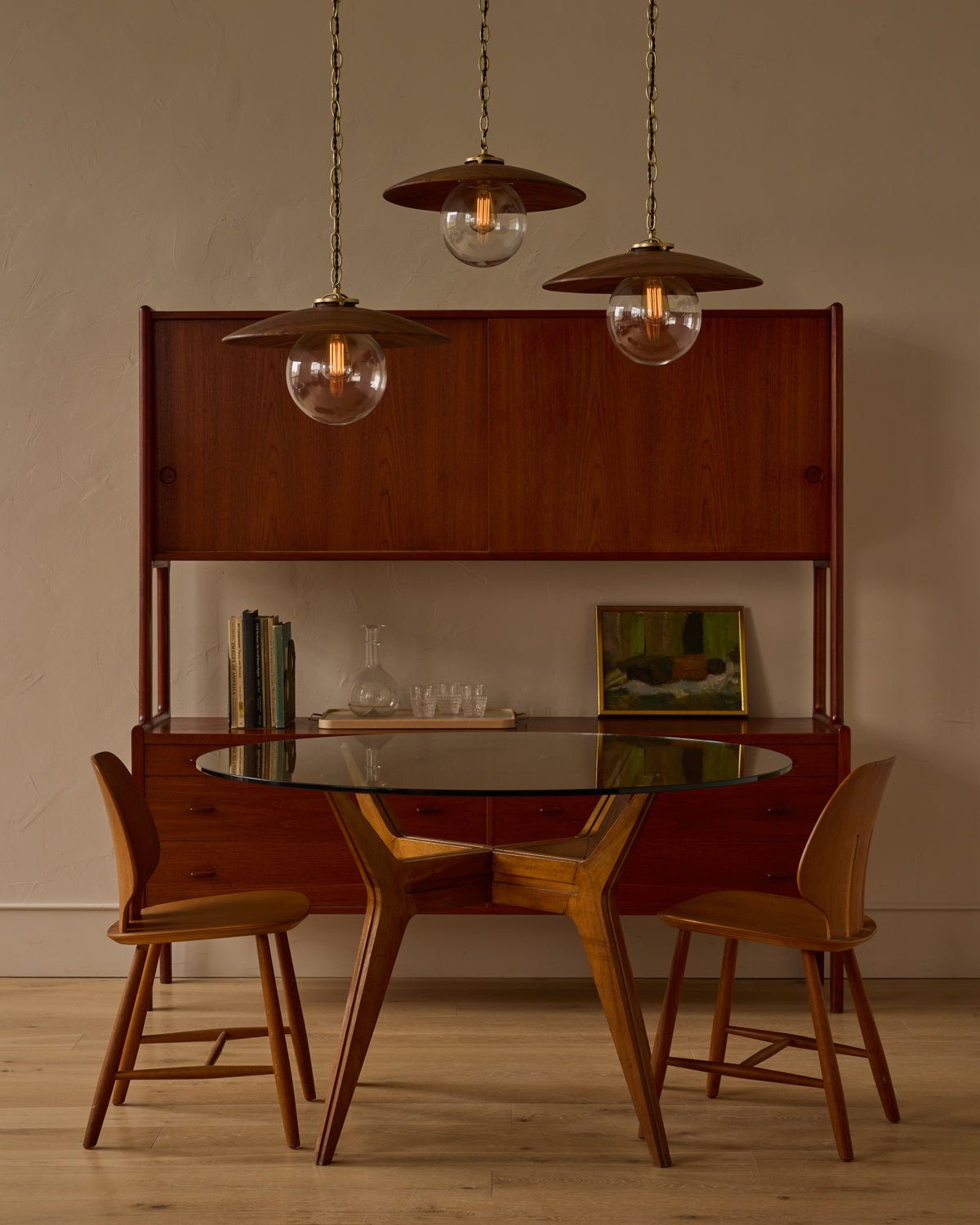 Large pendant light with oversized clear glass globe and decorative wooden clear maple shade with brass chain  #shade-finish_black walnut #globe_clear glass #cord-color_brown