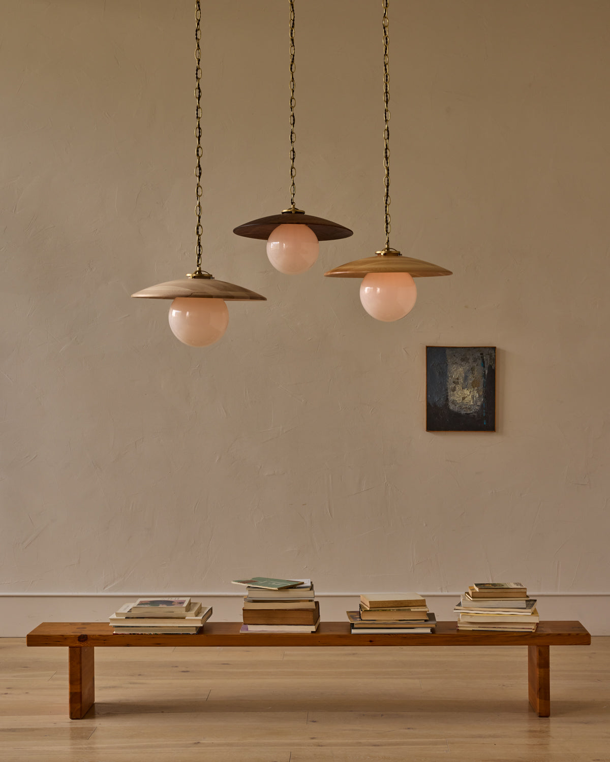 Large pendant light with oversized clear glass globe and decorative wooden clear maple shade with brass chain  #shade-finish_black walnut #globe_white glass #cord-color_brown