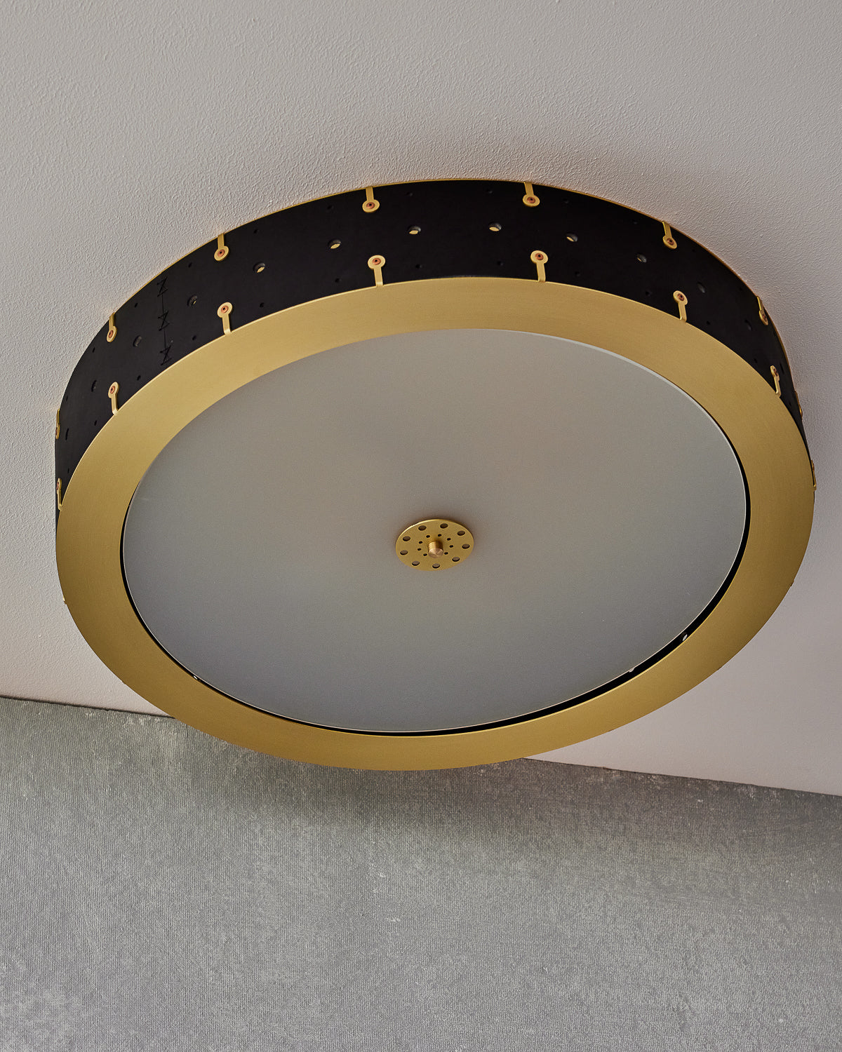Beautiful satin brass flush mount ceiling fixture with handstitched leather drum shade #leather-finish_black harness #size_24" drum