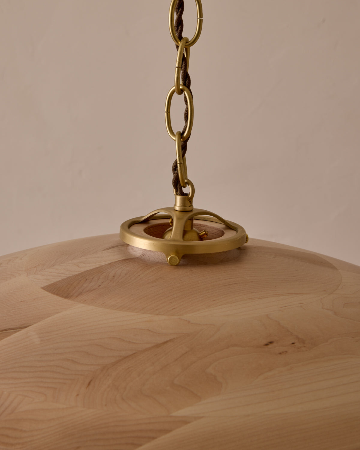 Large pendant light with oversized clear glass globe and decorative wooden clear maple shade with brass chain #shade-finish_clear maple #cord-color_brown