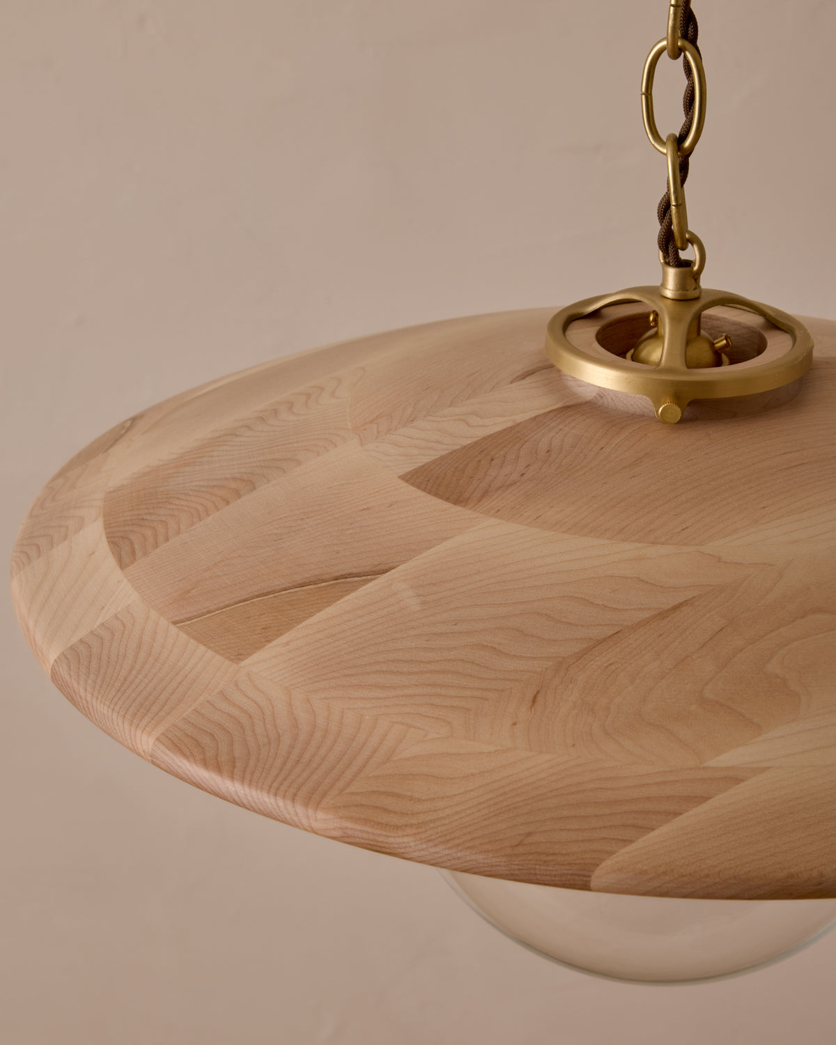 Large pendant light with oversized clear glass globe and decorative wooden clear maple shade with brass chain #shade-finish_clear maple #globe_clear glass #cord-color_brown