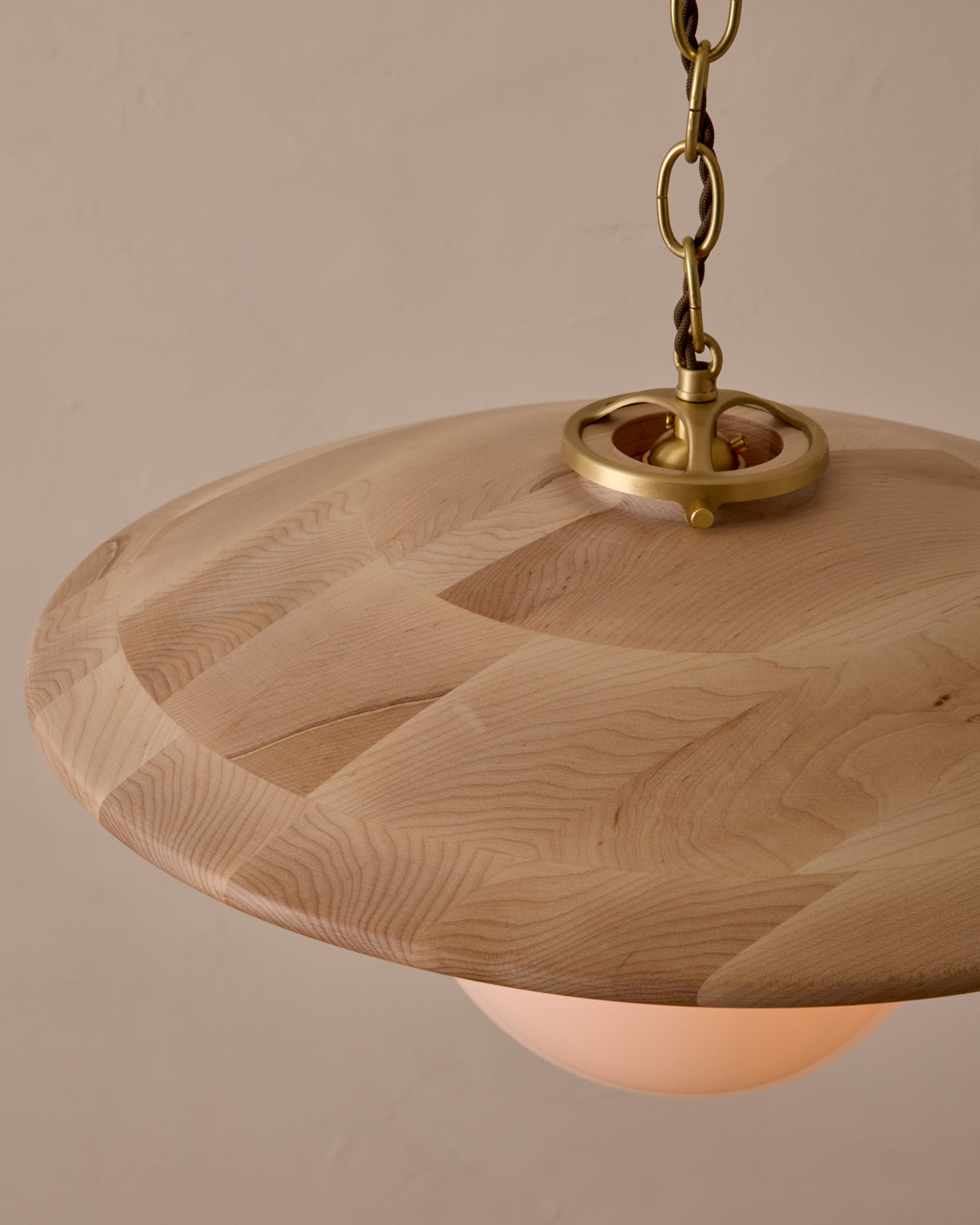 Large pendant light with oversized clear glass globe and decorative wooden clear maple shade with brass chain #shade-finish_clear maple #globe_white glass #cord-color_brown