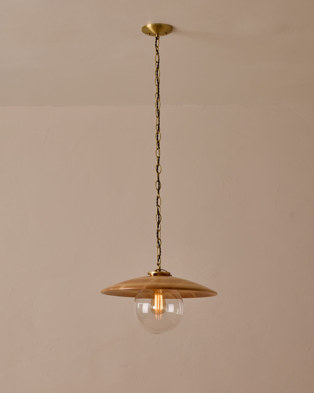 Large pendant light with oversized clear glass globe and decorative wooden clear maple shade with brass chain  #shade-finish_natural maple #globe_clear glass #cord-color_brown