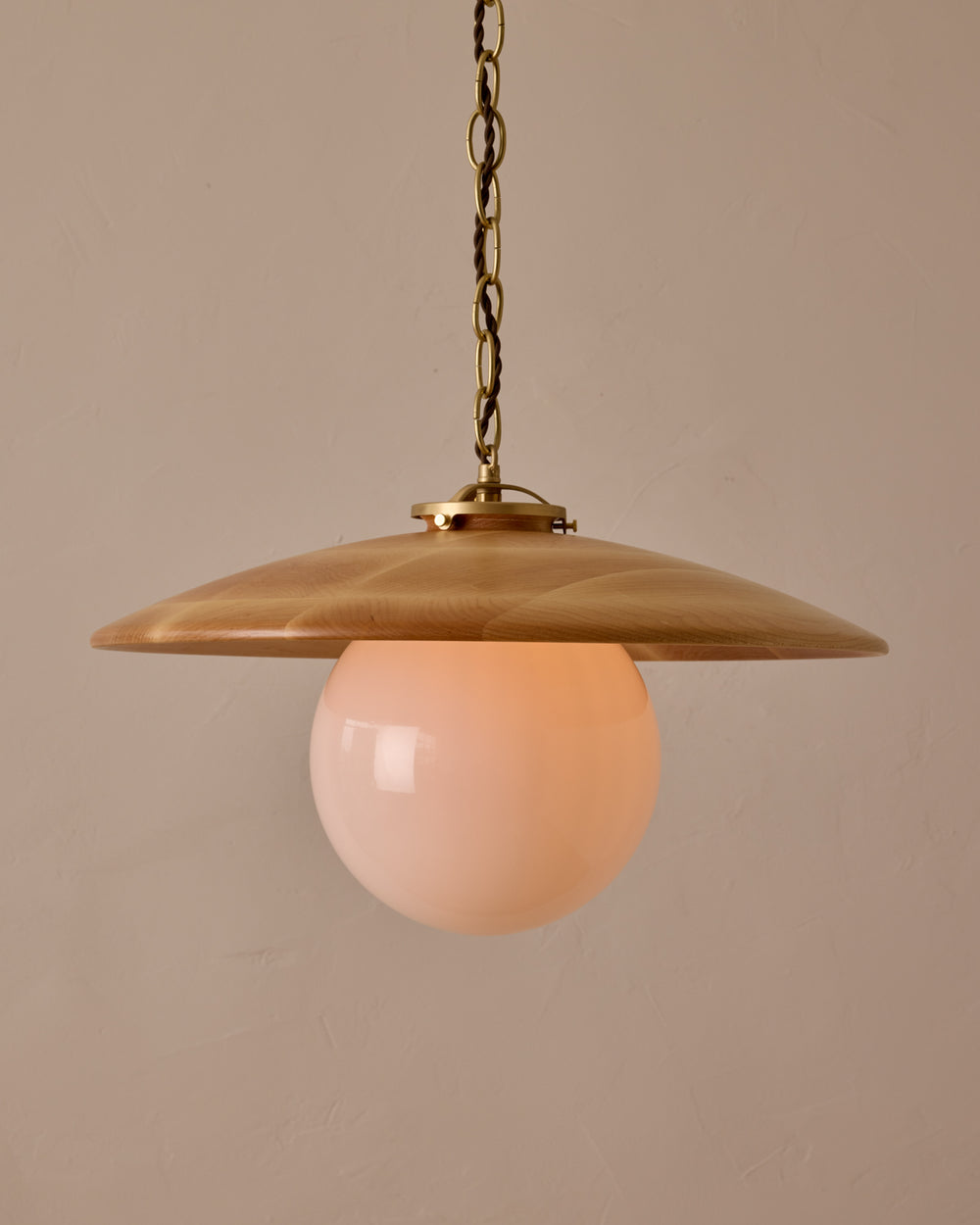 Large pendant light with oversized clear glass globe and decorative wooden clear maple shade with brass chain  #shade-finish_natural maple #globe_white glass #cord-color_brown