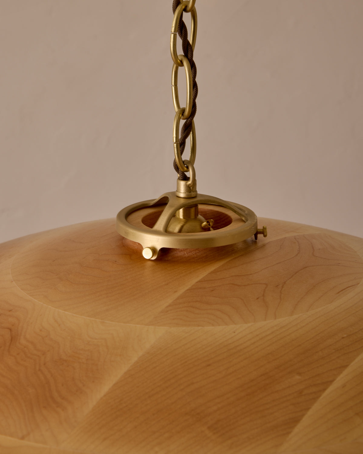 Large pendant light with oversized clear glass globe and decorative wooden clear maple shade with brass chain  #shade-finish_natural maple #cord-color_brown