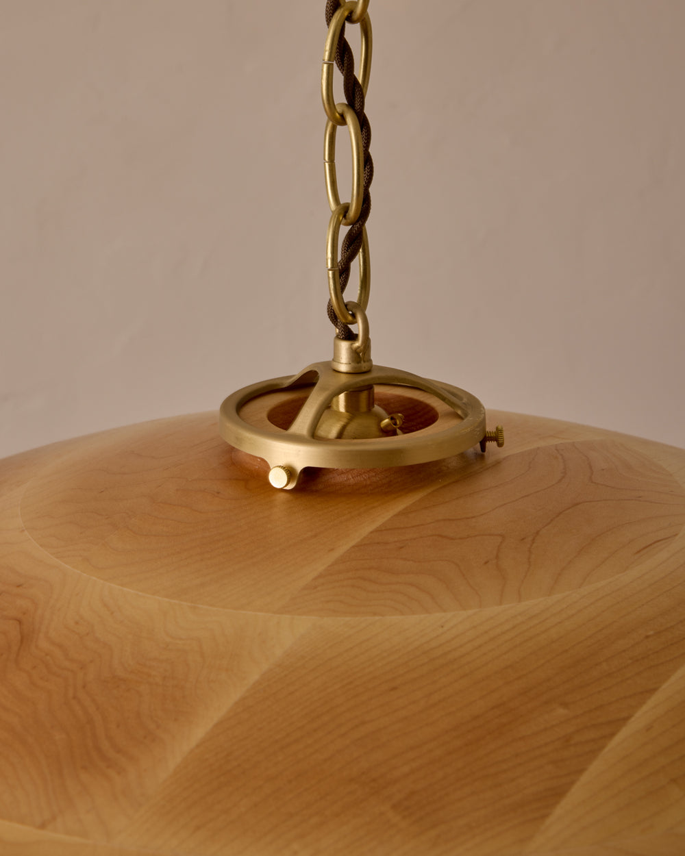 Large pendant light with oversized clear glass globe and decorative wooden clear maple shade with brass chain  #shade-finish_natural maple #cord-color_brown