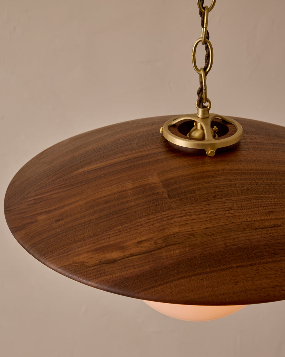 Large pendant light with oversized clear glass globe and decorative wooden clear maple shade with brass chain  #shade-finish_black walnut #globe_white glass #cord-color_brown