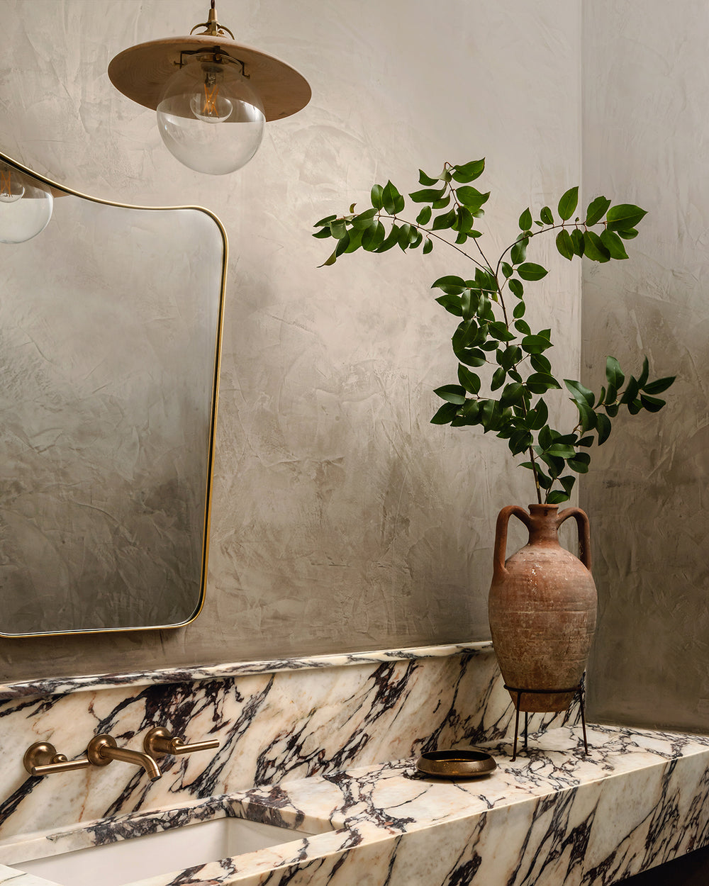 Pendant light with large clear glass globe and decorative wooden clear maple shade hanging over bathroom sink. Made by Lostine in Philadelphia. Simple interior design, made in the USA. Warm American Modern Design #shade-finish_clear maple #Cord-Color---Glass_beige Cord - Clear Globe
