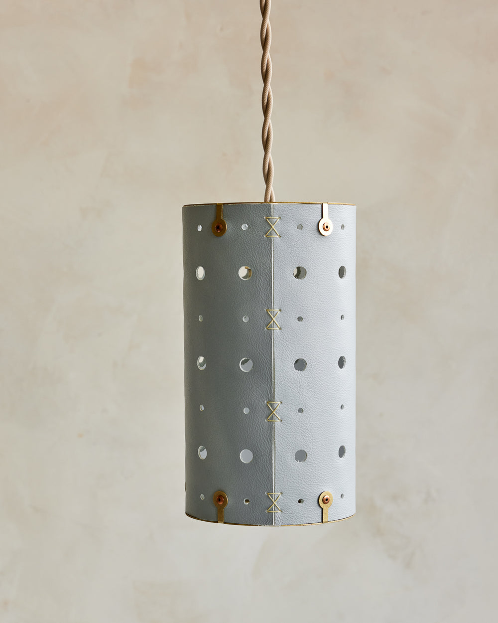 Charming leather pendant light with blue handstitched shade and brass accents  #color_cloud blue