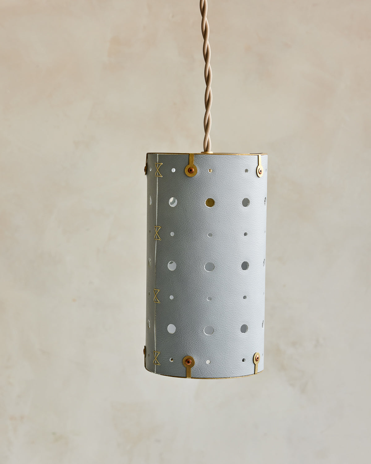 Charming leather pendant light with blue handstitched shade and brass accents #color_cloud blue