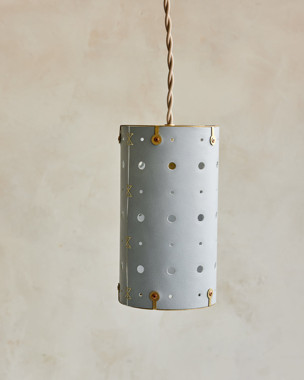 Charming leather pendant light with blue handstitched shade and brass accents #color_cloud blue