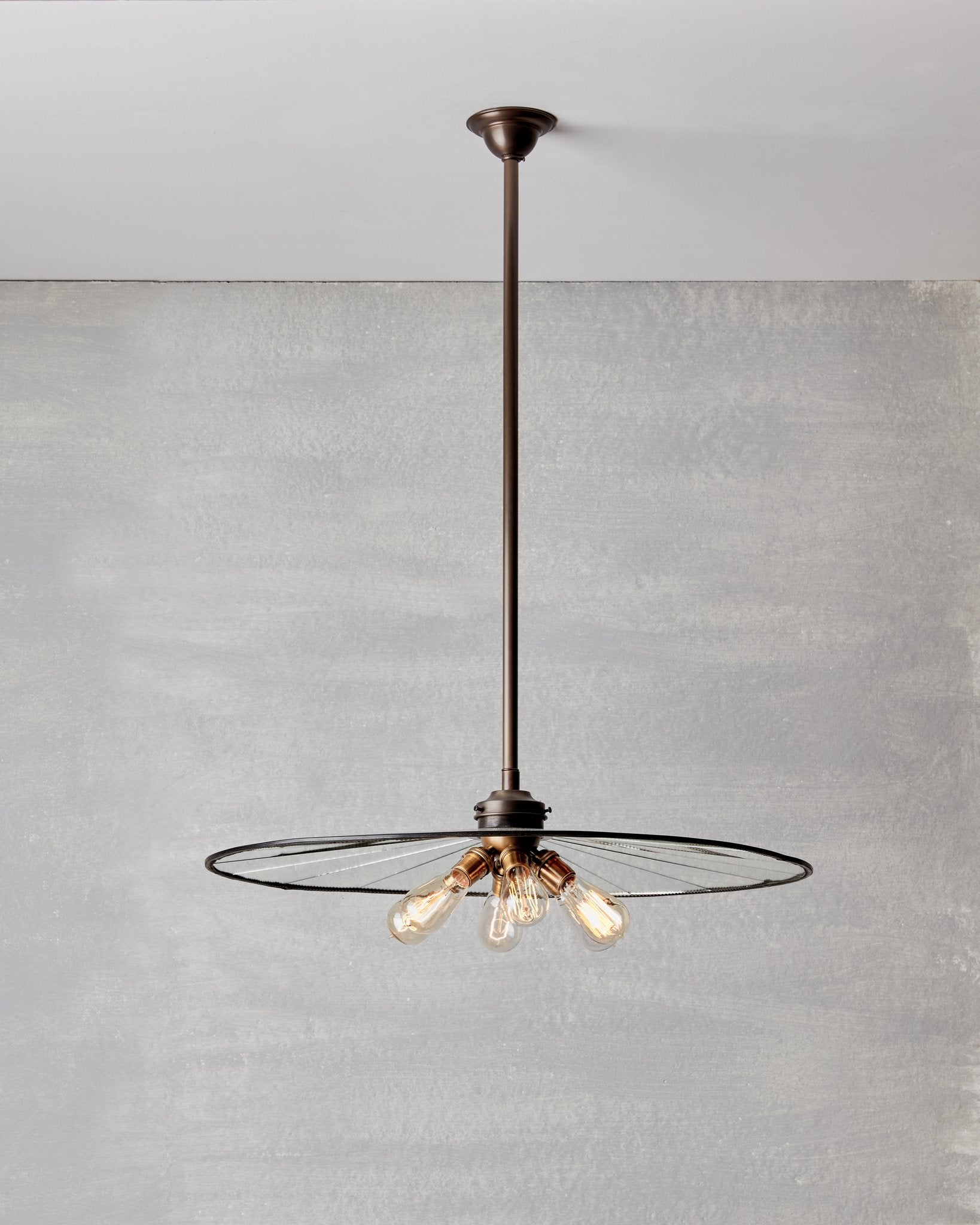 Large flat mirrored ceiling pendant with exposed lightbulbs. Made by RTO Lighting in Philadelphia. Hardwired light fixture. Simple interior design, made in the USA. #size_29" diameter